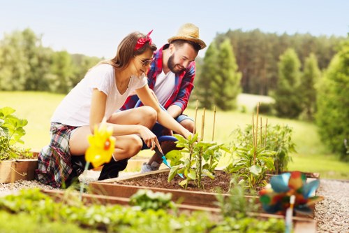 Expert landscaper working on innovative garden design in South Tottenham