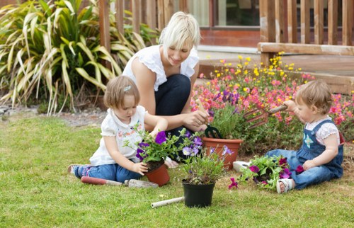 Professional landscapers planning a creative garden design