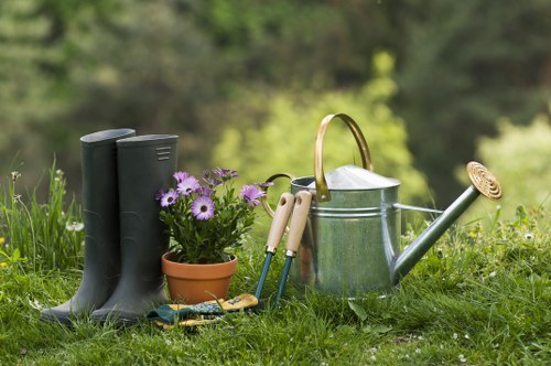 Expert landscaper planning a refined garden layout in Teddington