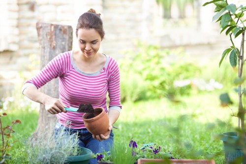 Landscaping maintenance in progress with eco-friendly practices.