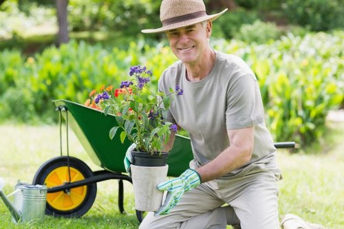 Eco-friendly landscape design featuring sustainable elements by Greencarpet Landscapers.